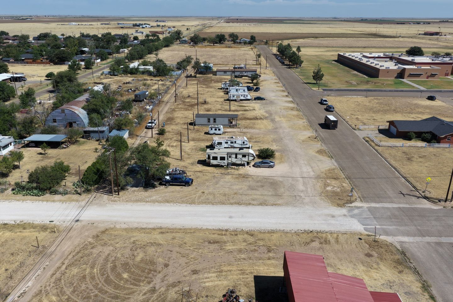 Aerial view along the RV sites and access road at Windmill Ranch.